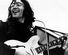 Image result for John Lennon Playing Guitar