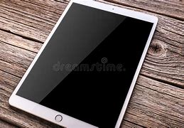 Image result for iPad On a Table in Houaw