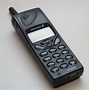 Image result for Old Silver Cell Phone