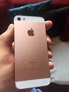 Image result for Rose Gold iPhone 5 Plus in Hand