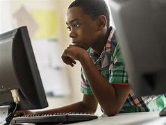 Image result for Black Kid with Book and Computer