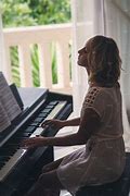 Image result for Beautiful Woman Playing Piano