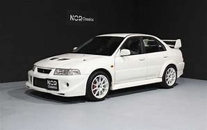 Image result for Mitsubishi Lancer Evolution Vi GSR Tommi Makinen Edition 1999