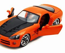 Image result for Orange Toy Car