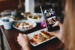 Image result for People with Phone and Food
