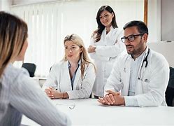 Image result for Doctor with Patient and Family