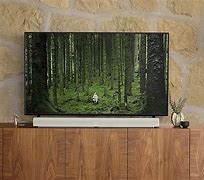 Image result for Atmos Sound Bar in a Media Wall