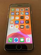 Image result for Pic of iPhone 13 On a Table