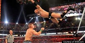 Image result for John Cena Punching Dwayne Johnson