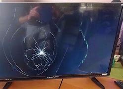 Image result for Picture of a Knocked Over Flat Screen TV