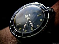 Image result for Gold Rolex Submariner Watch