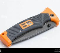 Image result for Orange and Grey Bear Gerber Knife