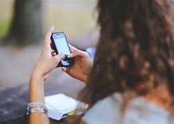 Image result for Person with Cell Phone