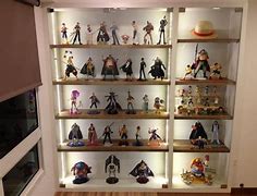 Image result for Entertainment TV Stand with Figurines On It Photo