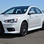 Image result for White Mitsubishi Lancer Evolution