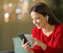 Image result for Women Talking Earbud Phone