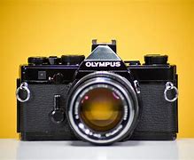 Image result for Old Olympus Fixed Lens Film Camera