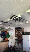 Image result for Fishing Rod Holders for Garage Ceiling