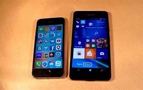 Image result for Nokia Lumia 820 vs iPhone 5S