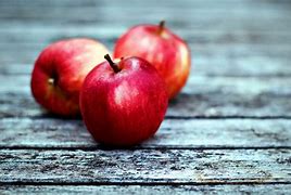 Image result for Small Apple with a Red Background