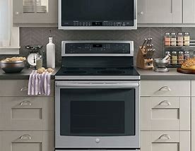 Image result for Microwave above Oven
