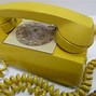 Image result for Yellow Wall Rotary Phone