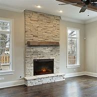 Image result for Stacked Stone Fireplace Mantels