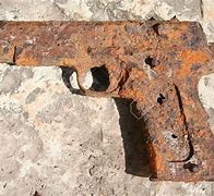 Image result for Rusted Gun