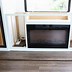 Image result for television lifts with fireplaces