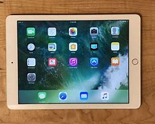 Image result for Apple Tablet with Square in Homme Buttom