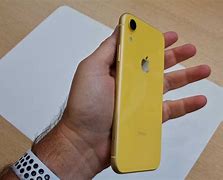 Image result for iPhone XR Hand Held Photo