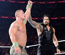 Image result for Roman Reigns Spear On John Cena