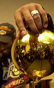 Image result for Kobe with Championship Trophy