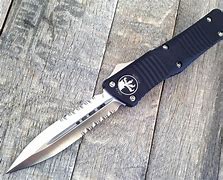 Image result for Automatic Folding Knife Hidden Button