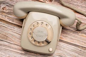Image result for Beige Rotary Phone
