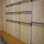 Image result for Retail Store Adjustable Wall Mounted Shelving Systems