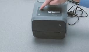 Image result for Feed Button of Zebra Printer