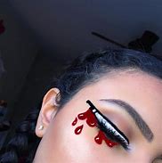 Image result for Girl Doing Eye Liner with Knife