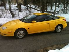 Image result for Yellow Saturn SC2