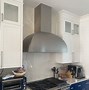 Image result for Copper Hood in Kitchen Blue Cabinets