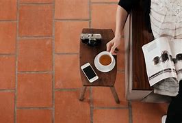 Image result for iPhone 14 Pro Max On Coffee Table