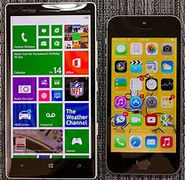 Image result for Nokia Lumia 925 vs iPhone 5