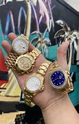 Image result for Rolex Watch with a Gold Bee On the Dial