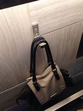 Image result for Purse Hook Location at Bar