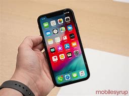 Image result for iPhone XR in Black Guys Hand