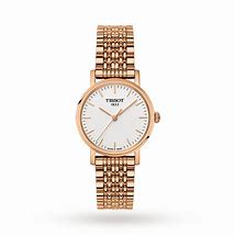 Image result for White Swatch Watch with Rose Gold