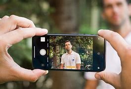 Image result for Portrait Comparing Photos with Android Phone and iPhone