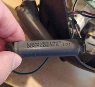 Image result for Round Battery How to Replace