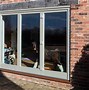 Image result for Bifold Doors Timber Cladding
