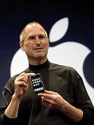 Image result for Steve Jobs Looking at iPhone